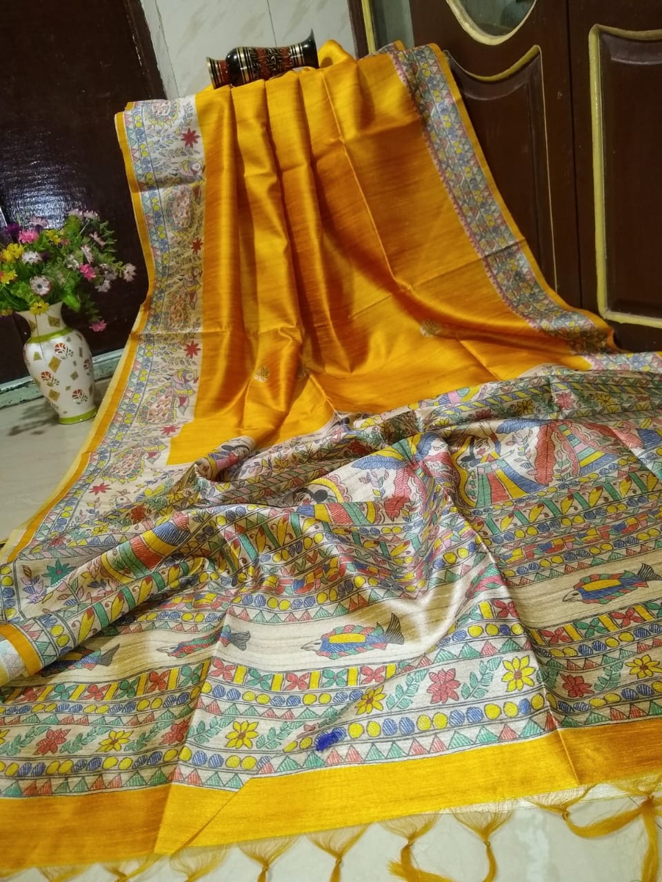 Yellowish orange Madhubani Printed Pure Silk Mark Certified Tussar Ghicha Silk Sarees - Dailybuyys