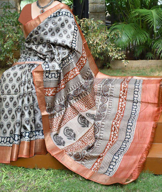 Beige Orange Block Printed Zari Border Pure Silk Mark Certified Tussar Silk Sarees