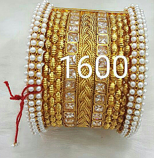 Golden white stone Bracelet Get Extra 10% Discount on All Prepaid Transaction