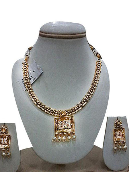 Beautiful Golden box design white stone and pearl necklace