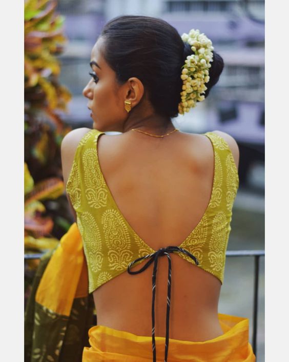 Yellow Backless Tied Block printed sleeveless blouses(Add to Cart 15% Off) Get Extra 10% Discount on All Prepaid Transaction