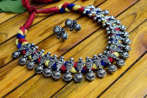 Rounded Red Beads with German Silver Heavy Beads and Peacock Pendant Get Extra 10% Discount on All Prepaid Transaction