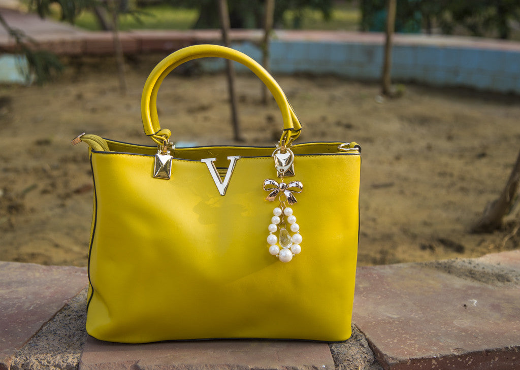 Yellow Medium V Shaped Hand Bags