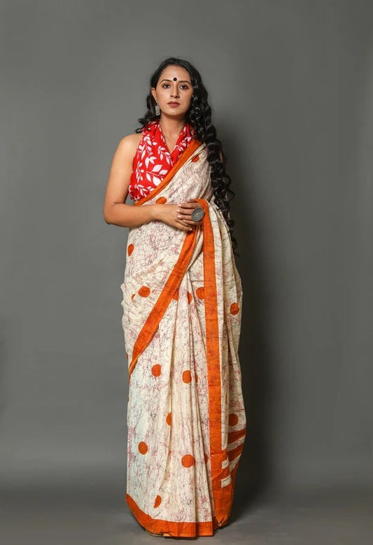 Beige Orange Mulmul Batik Sarees